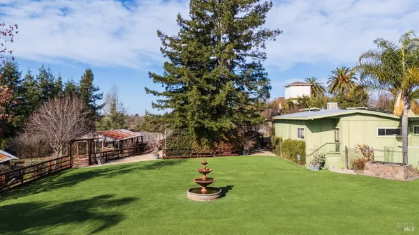 a view of house with garden
