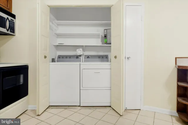 a bathroom with a shower and a toilet