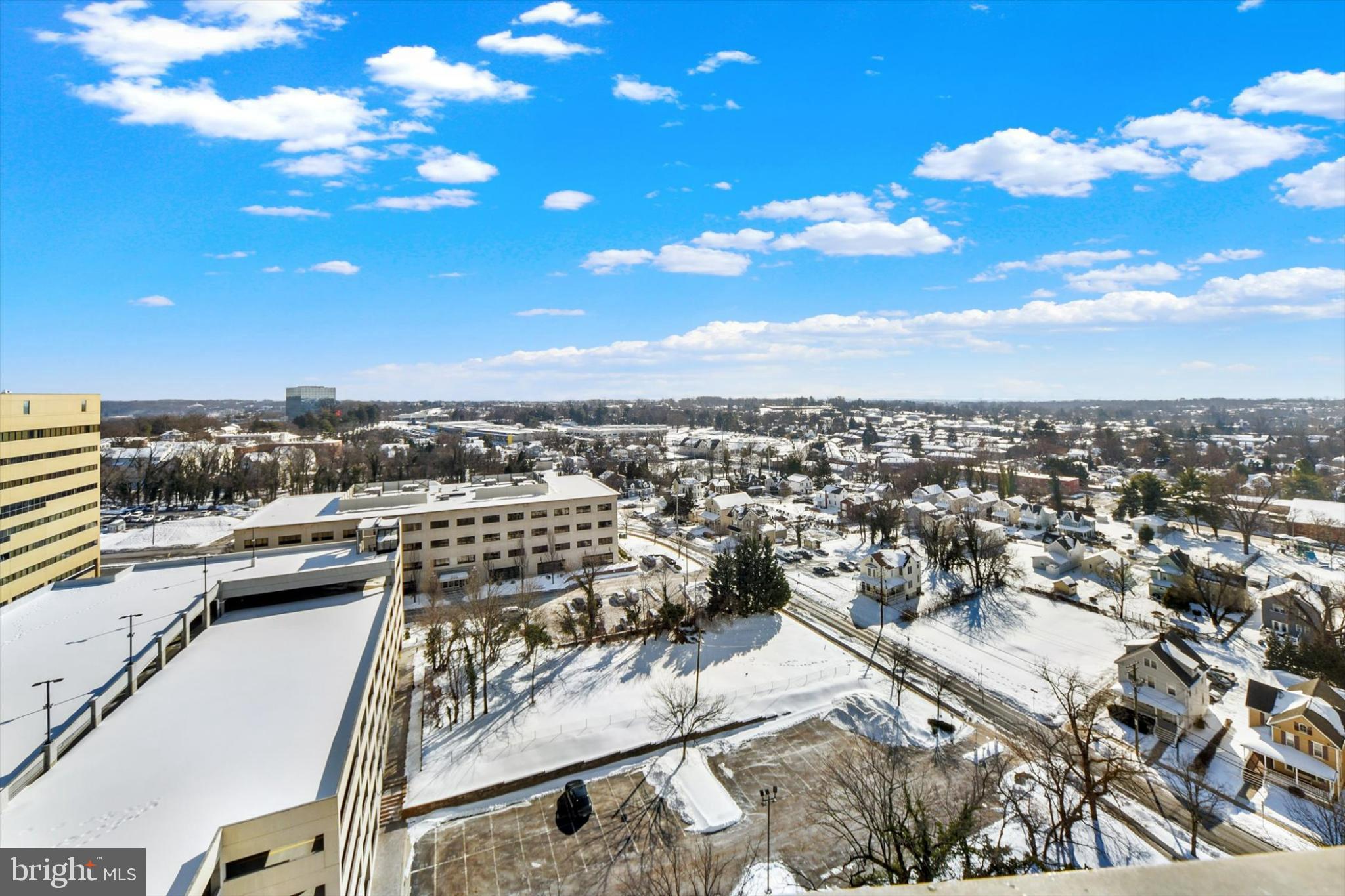 205 East Joppa Road, Unit 1604 Towson, MD 21286 - Photo 18 of 19 Balcony view under a bright sky.