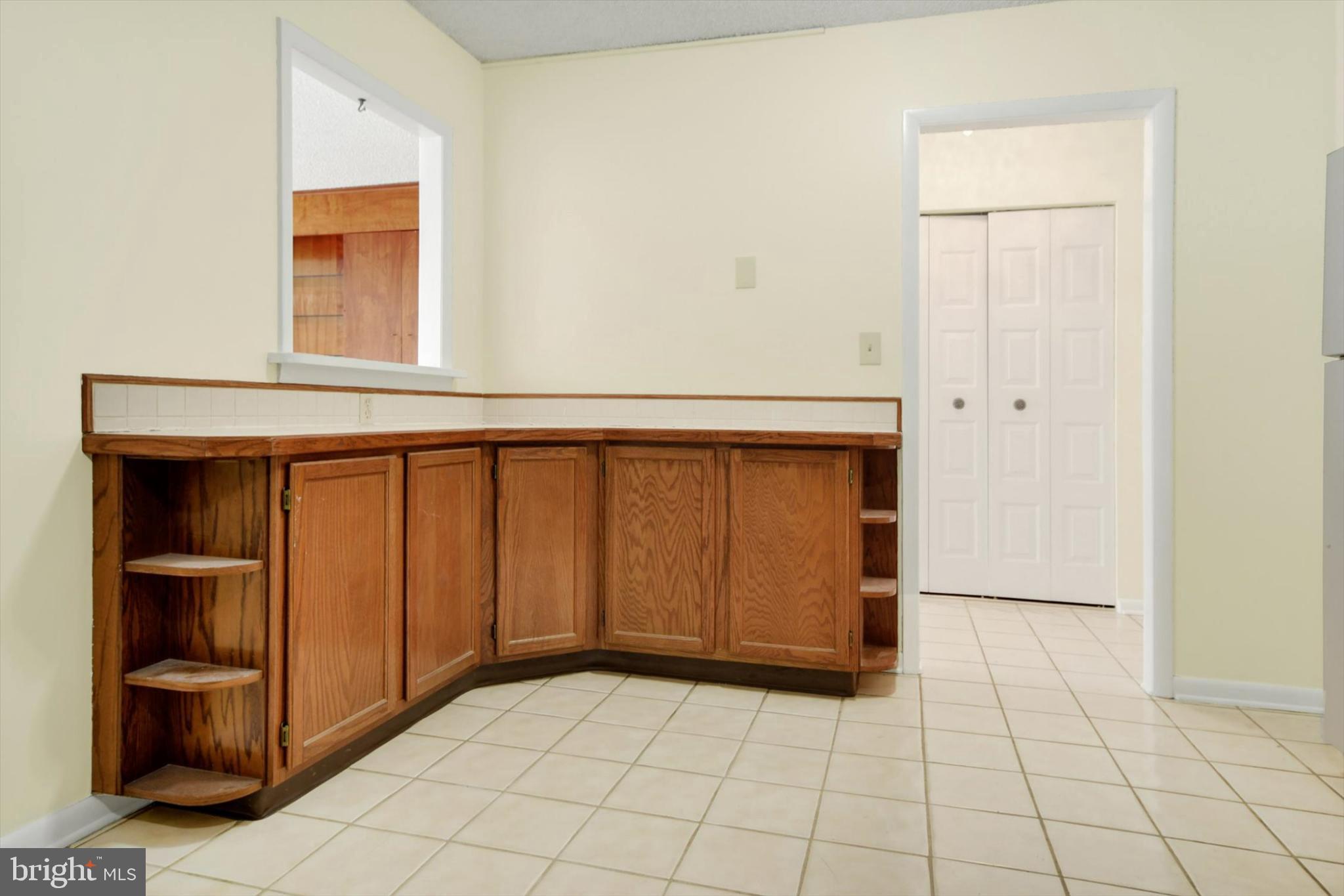 205 East Joppa Road, Unit 1604 Towson, MD 21286 - Photo 7 of 19 More kitchen storage with pass through awaits you.