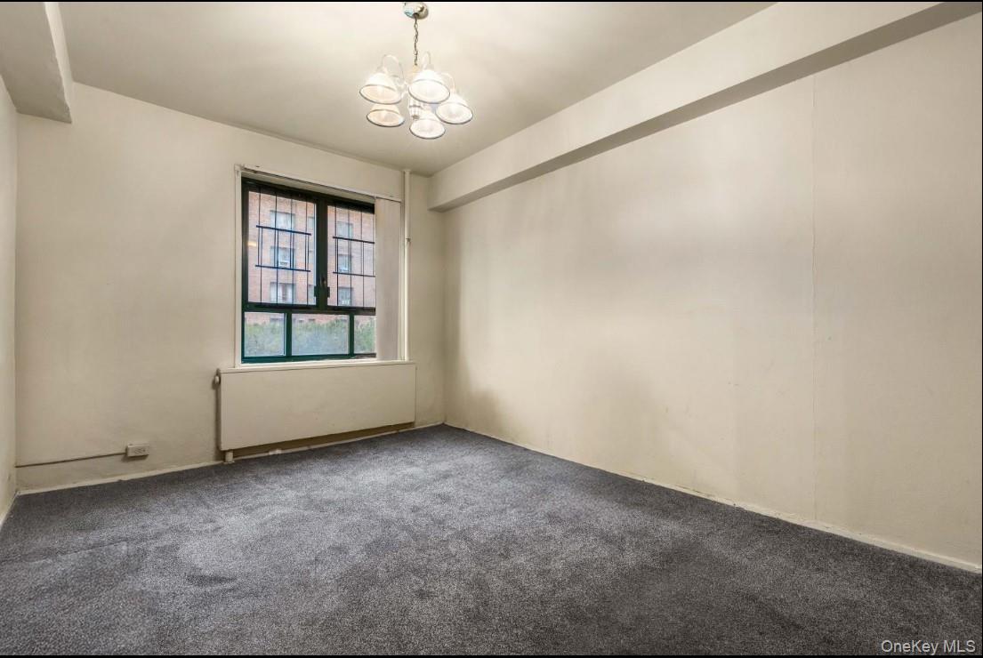 1480 Parkchester Road Bronx, NY 10462 - Photo 5 of 5 a view of an empty room with a window