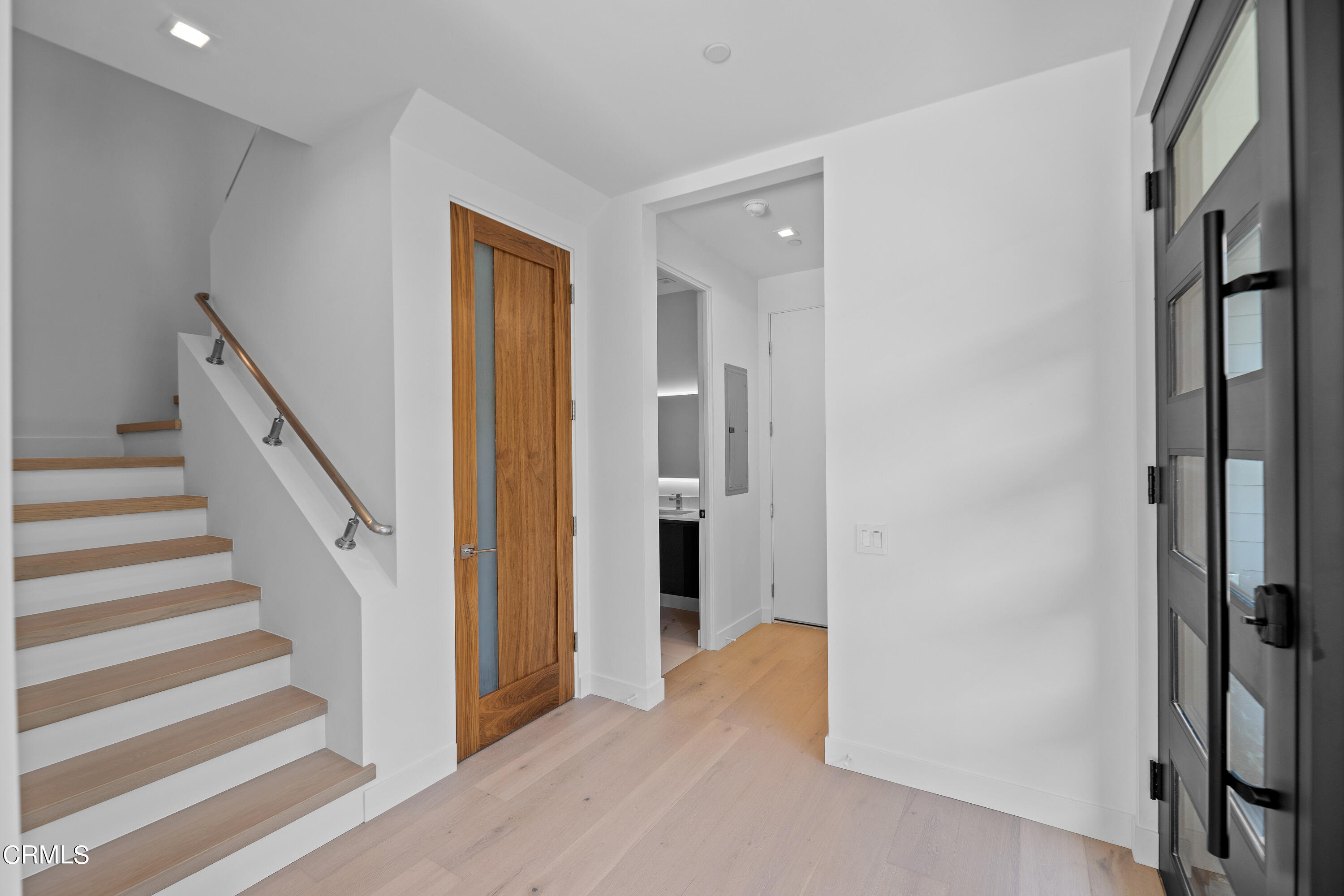 1005 Catamaran Street Oxnard, CA 93035 - Photo 11 of 35 a view of a hallway with wooden floor and entryway