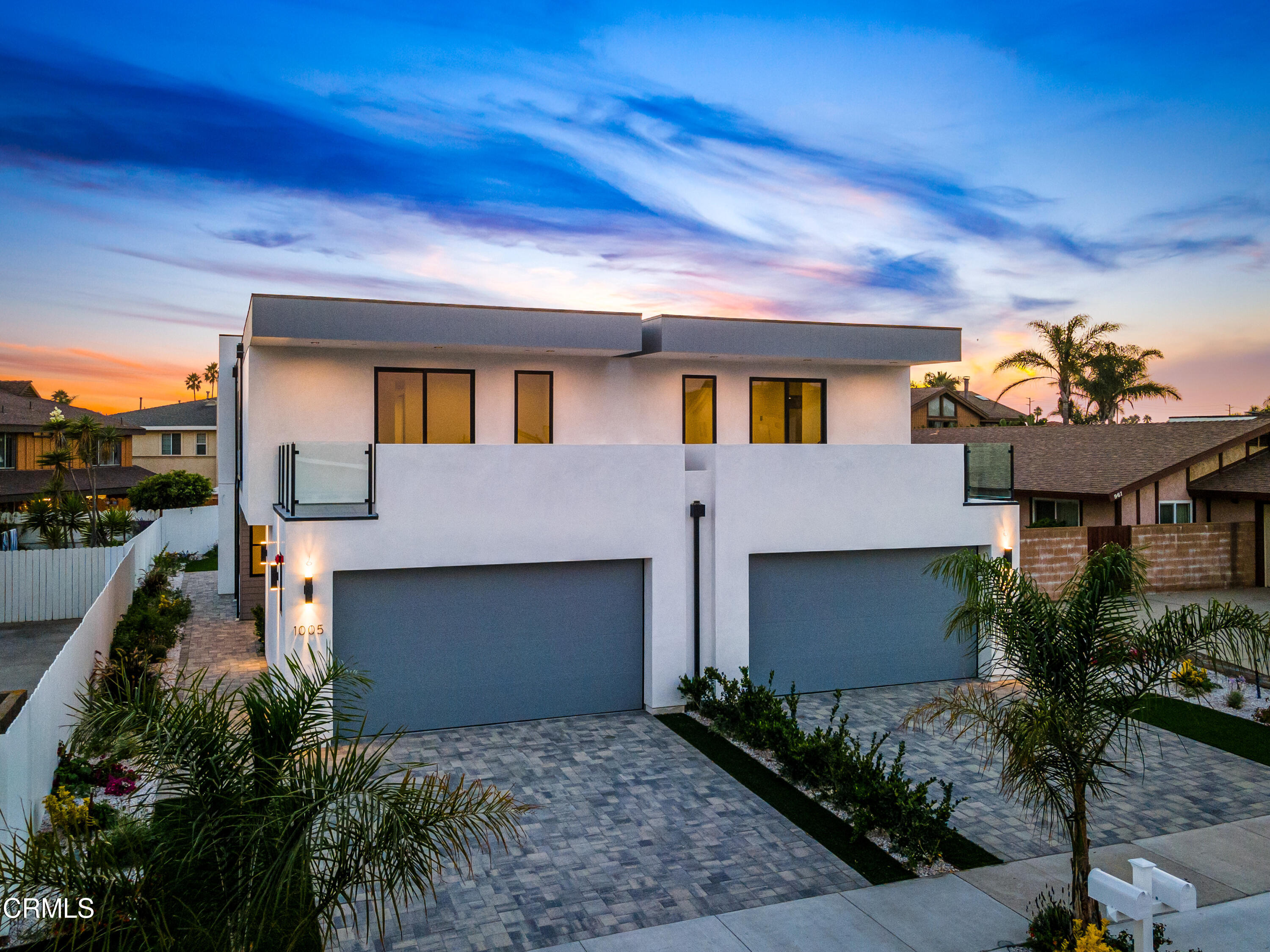 1005 Catamaran Street Oxnard, CA 93035 - Photo 2 of 35 a front view of a house with a yard