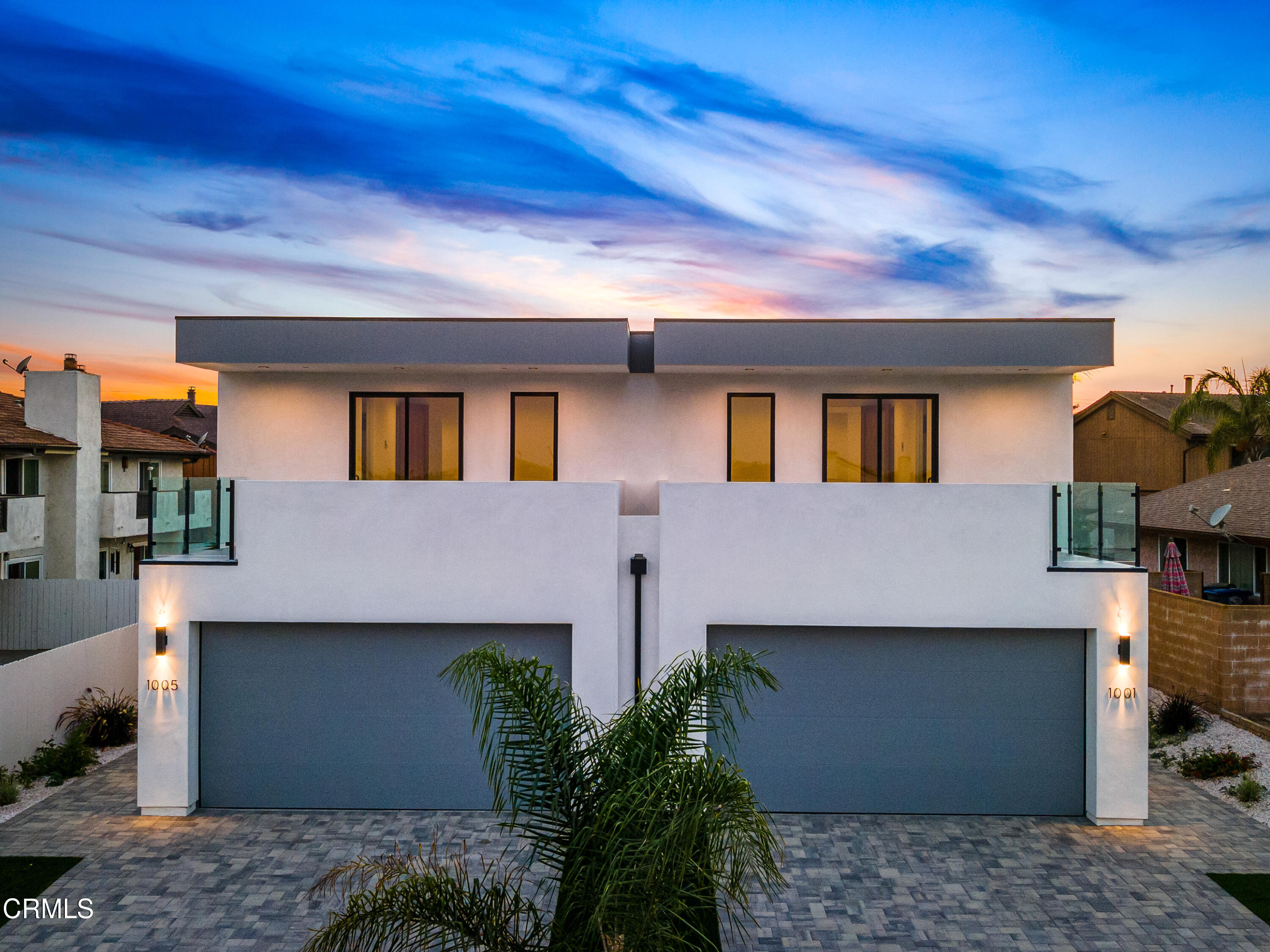 1005 Catamaran Street Oxnard, CA 93035 - Photo 3 of 35 a front view of a house with plants