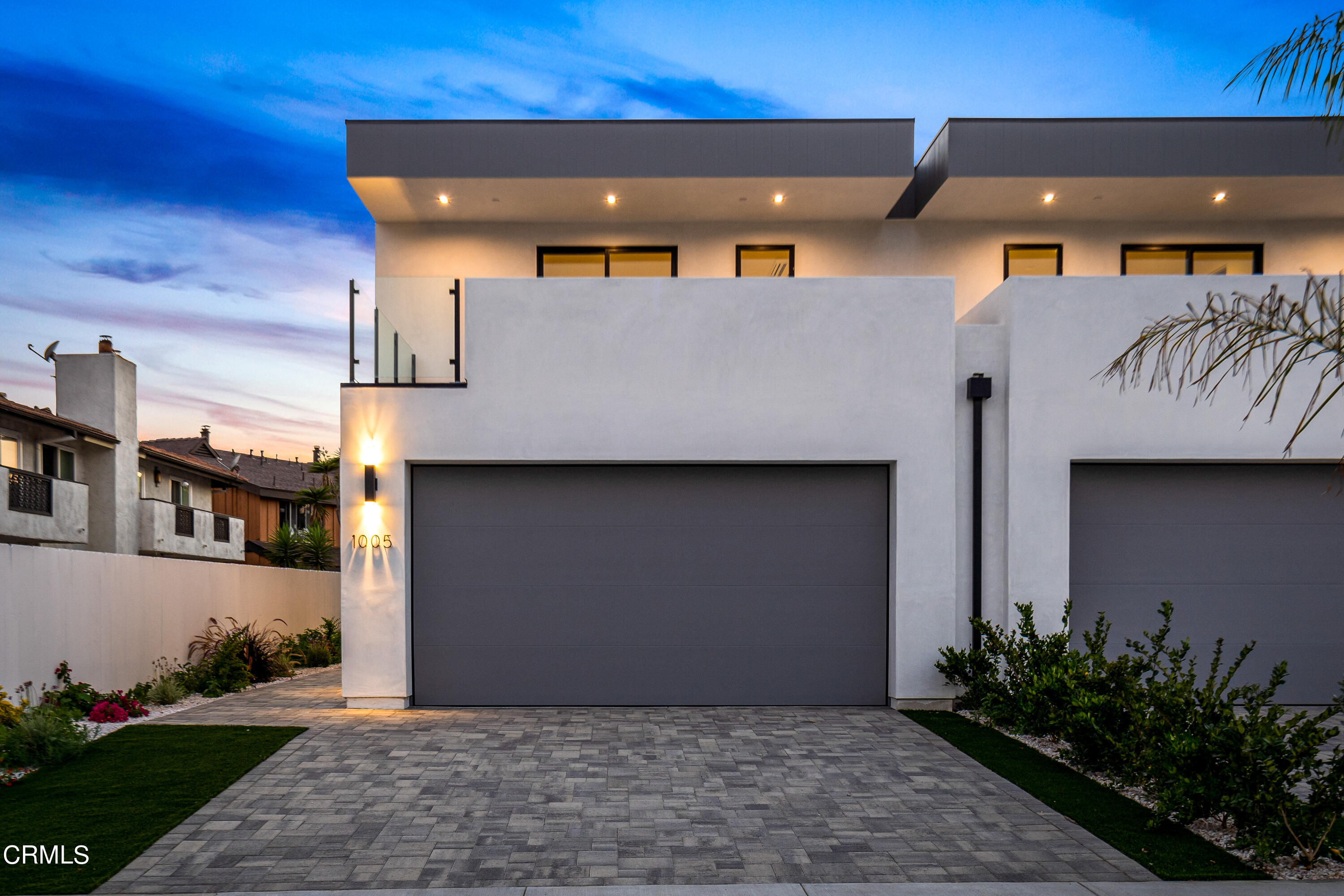 1005 Catamaran Street Oxnard, CA 93035 - Photo 5 of 35 a front view of a house with a yard