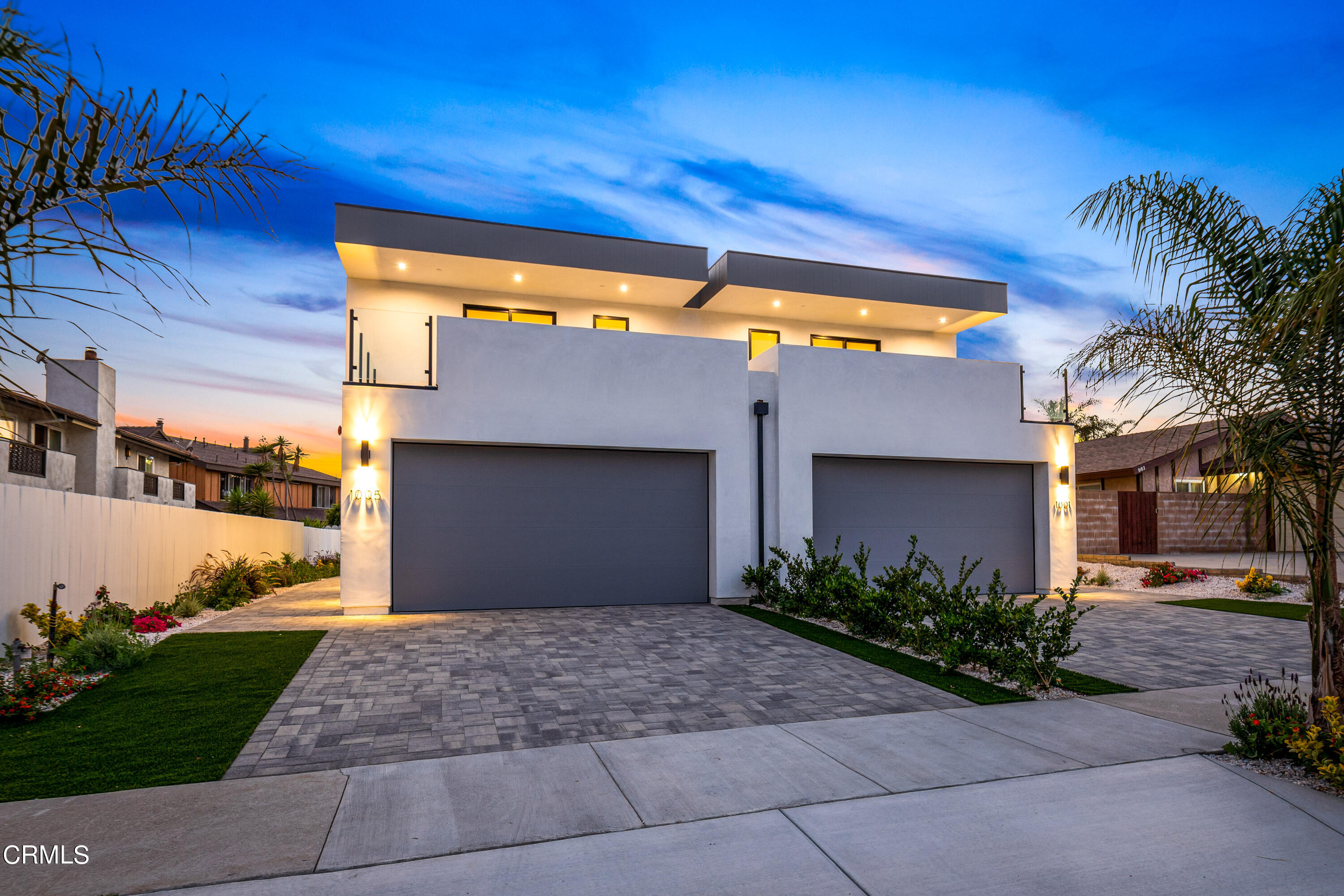 1005 Catamaran Street Oxnard, CA 93035 - Photo 7 of 35 a front view of a house with a yard