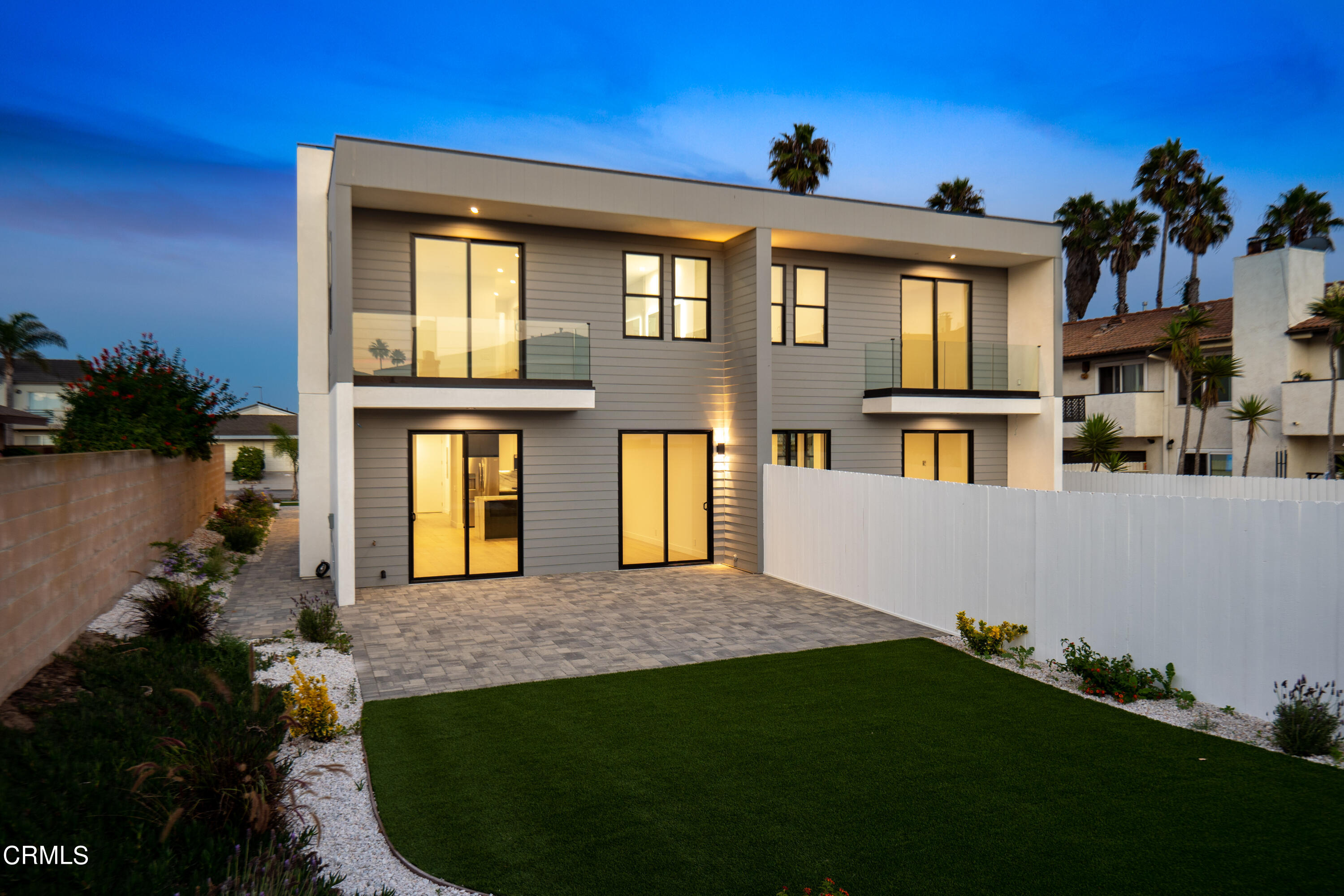 1005 Catamaran Street Oxnard, CA 93035 - Photo 9 of 35 a front view of a house with garden