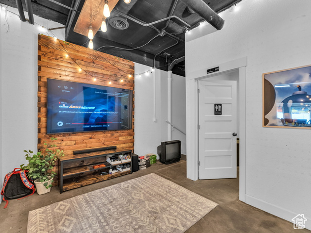 40 South Freedom Boulevard Provo, UT 84601 - Photo 81 of 111 Living room with unfinished concrete floors and baseboards