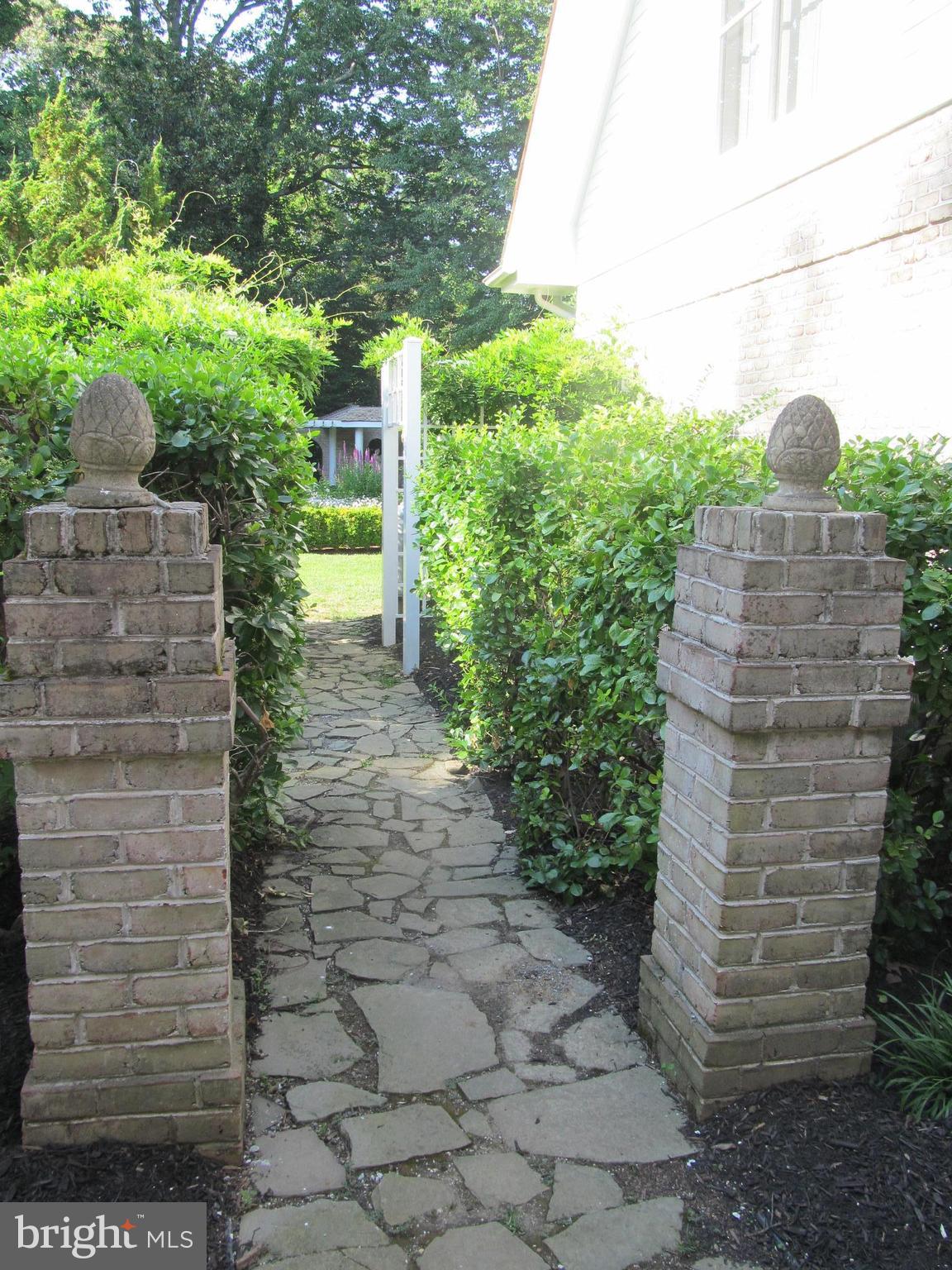 1917 Hidden Point Road Annapolis, MD 21409 - Photo 14 of 30 Stone walkway to in-ground pool