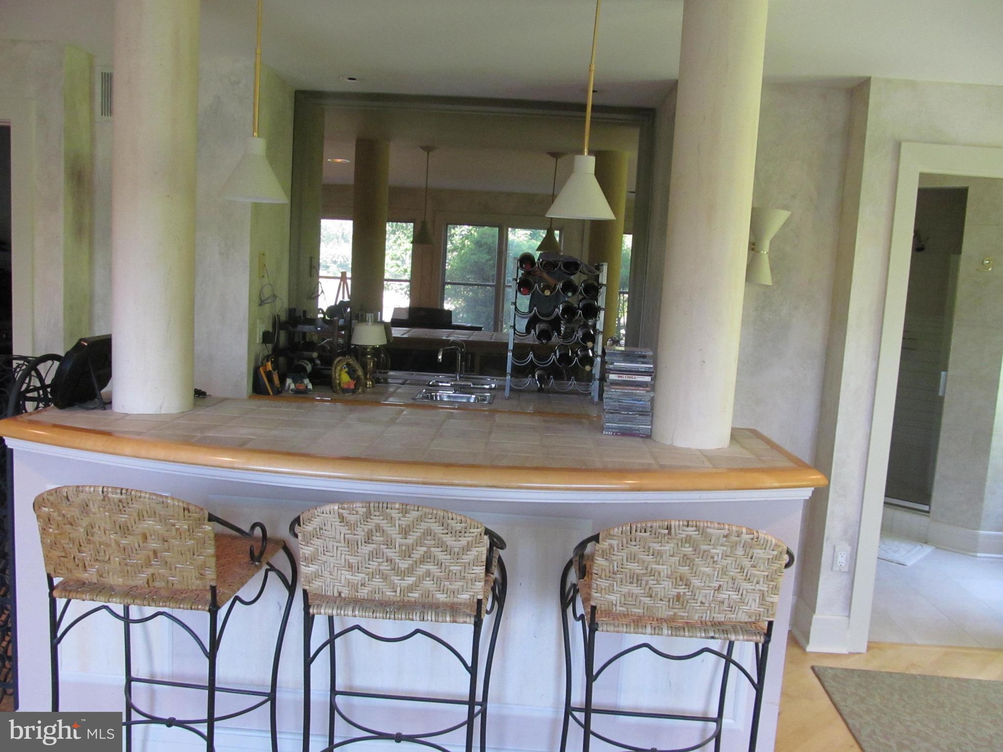 1917 Hidden Point Road Annapolis, MD 21409 - Photo 25 of 30 Bar in Sunroom overlooking water