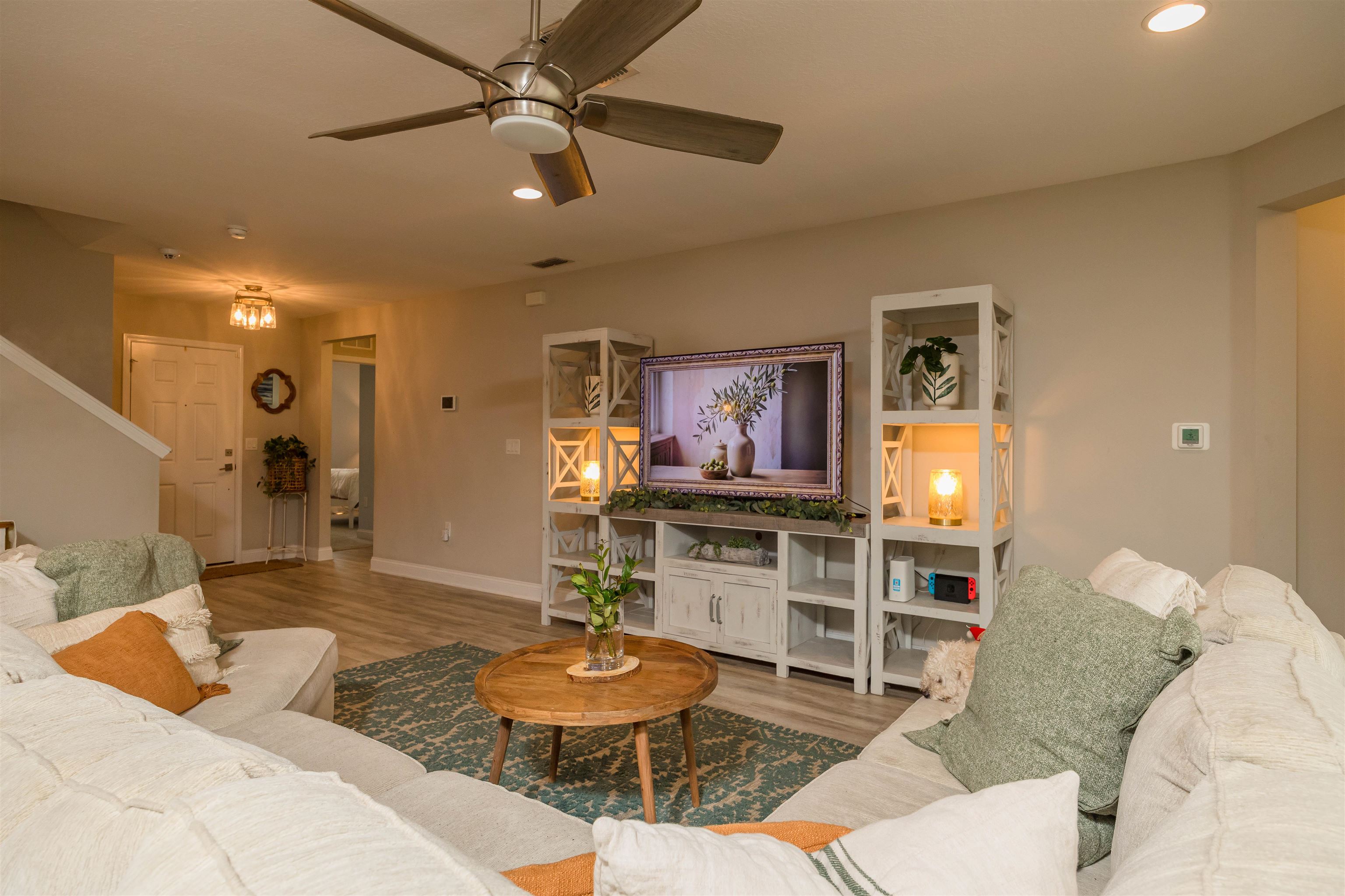 151 Birdfield Court St. Augustine, FL 32092 - Photo 12 of 73 a living room with furniture and a flat screen tv