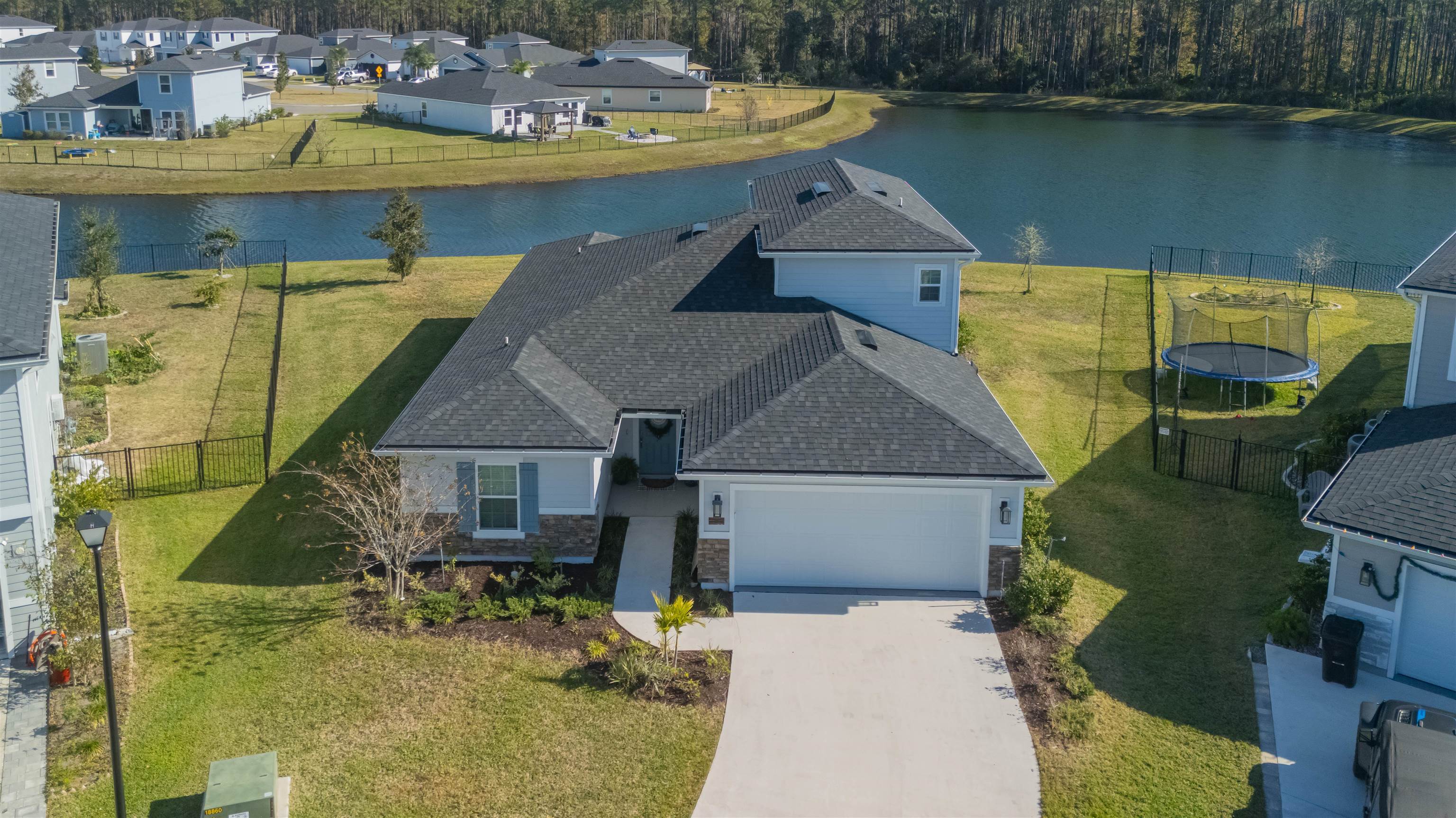 151 Birdfield Court St. Augustine, FL 32092 - Photo 26 of 73 a aerial view of a house with a lake view