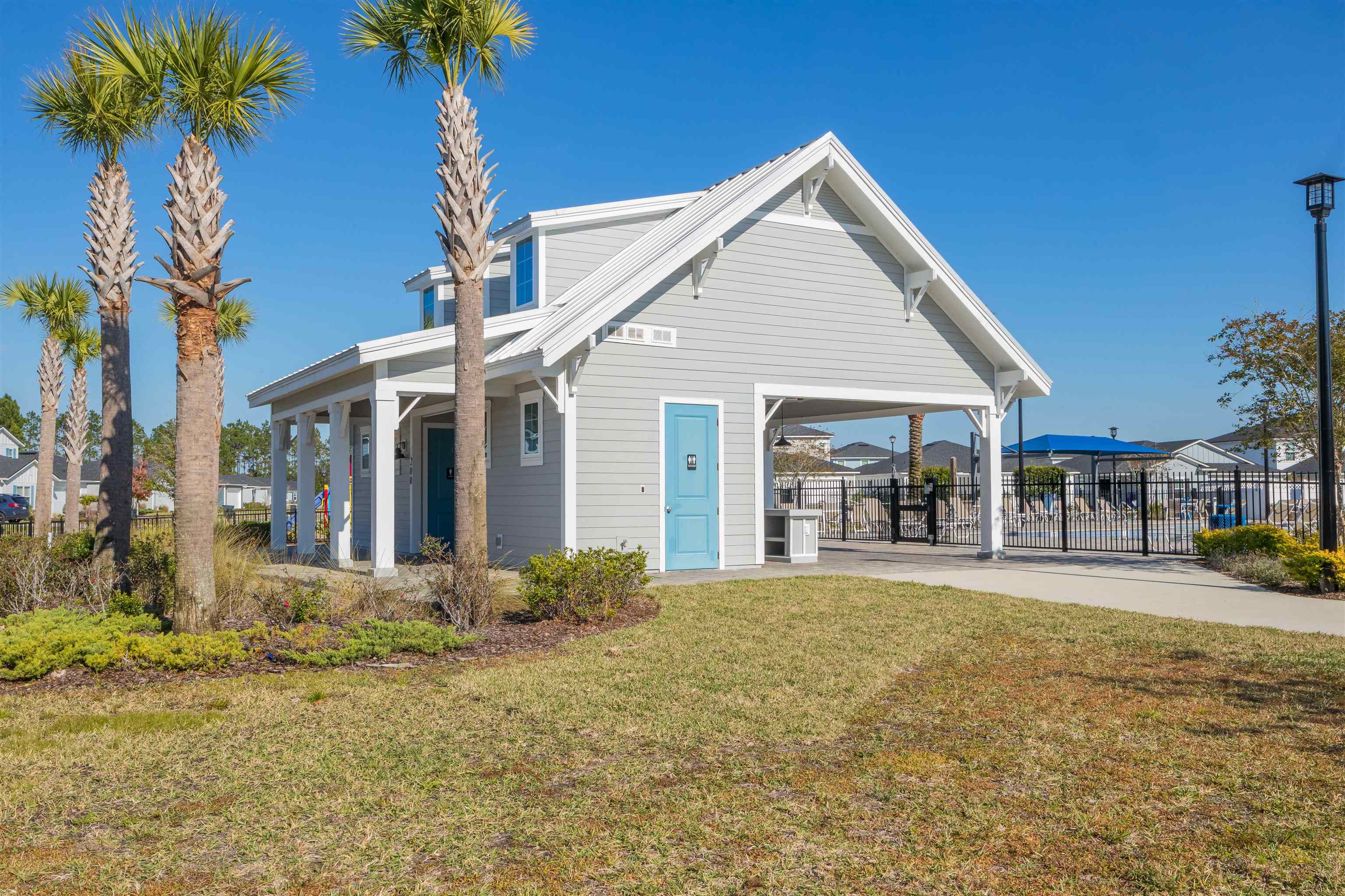 151 Birdfield Court St. Augustine, FL 32092 - Photo 65 of 73 a view of a house with a yard and potted plants