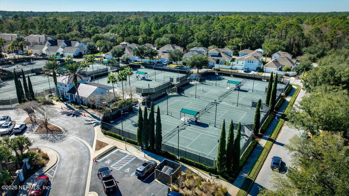 315 Via Castilla, Unit 204 St. Augustine, FL 32095 - Photo 12 of 18 an aerial view of multiple houses with yard