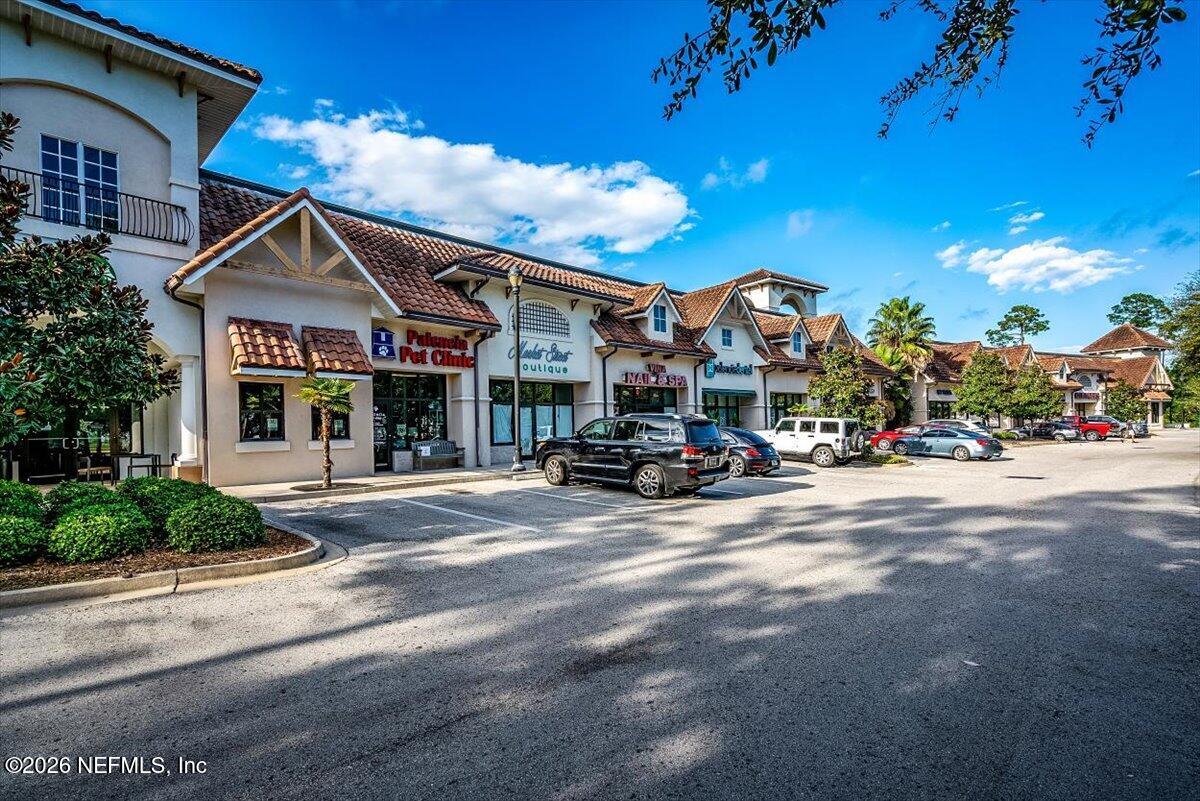 315 Via Castilla, Unit 204 St. Augustine, FL 32095 - Photo 18 of 18 a view of a town with brick building and many windows