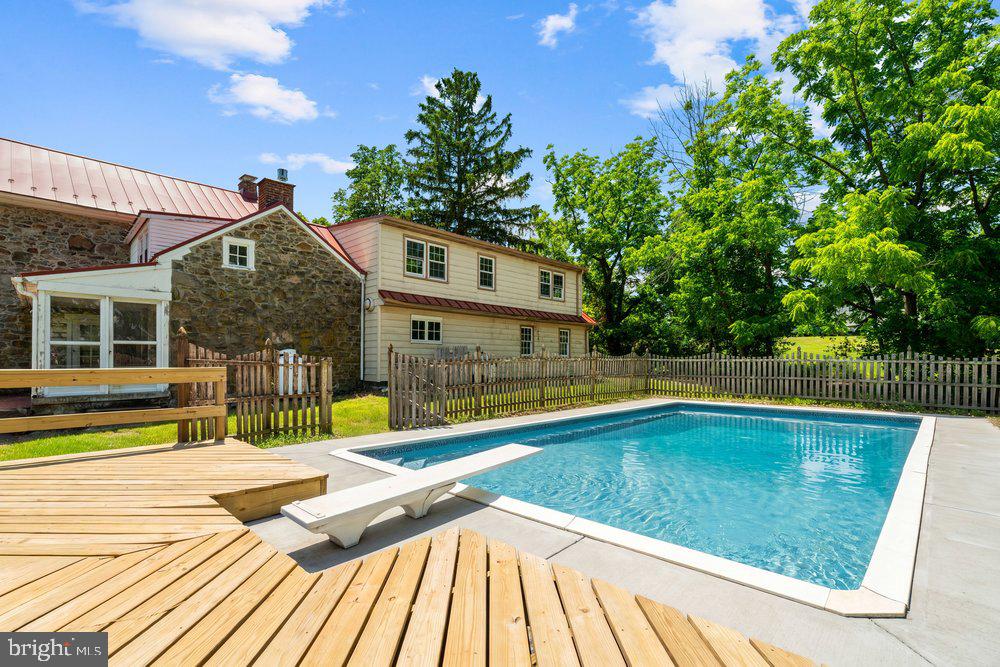 201 East Moyer Road Pottstown, PA 19464 - Photo 51 of 64 a view of a house with pool and chairs
