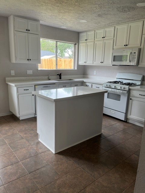 467 Buoy Road Webster, TX 77598 - Photo 20 of 23 New kitchen with lots of new custom cabinets using waterproof wood.