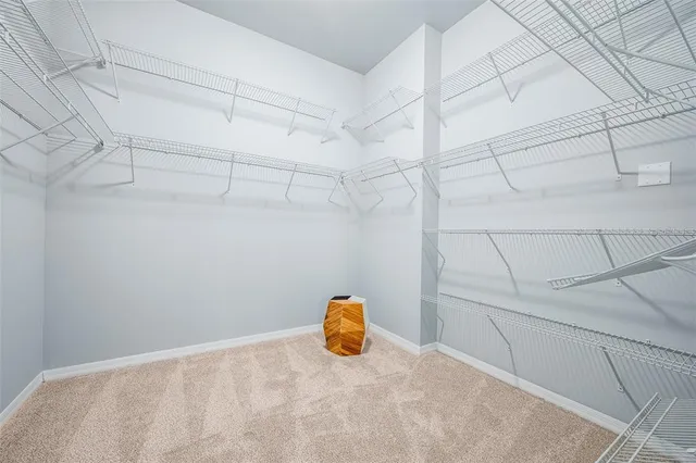 a view of a room with racks on the wall