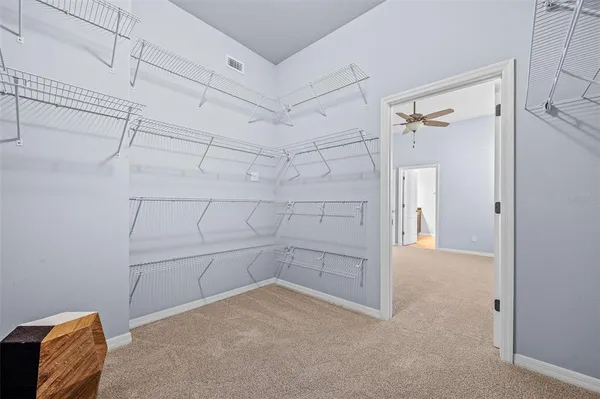 a view of a room with racks on the wall
