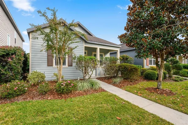 front view of a house with a yard