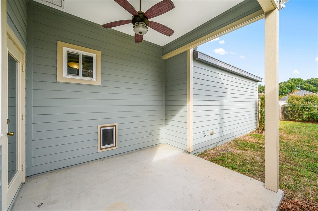 7891 Southwest 82nd Drive Gainesville, FL 32608 - Photo 25 of 38 a view of a house with a yard