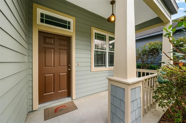 swimming pool view with a seating space