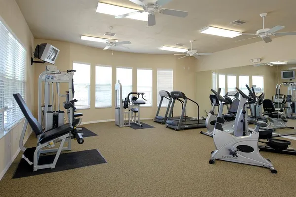swimming pool view with a seating space