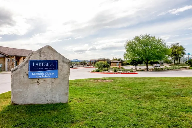 a view of swimming pool with an outdoor seating