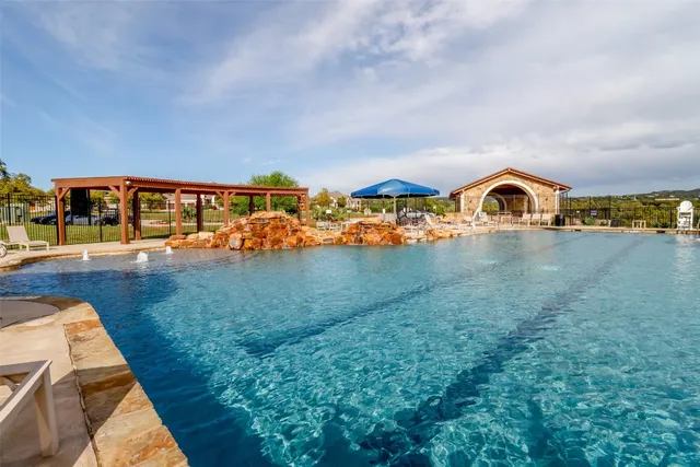 a view of a yard and front view of a house