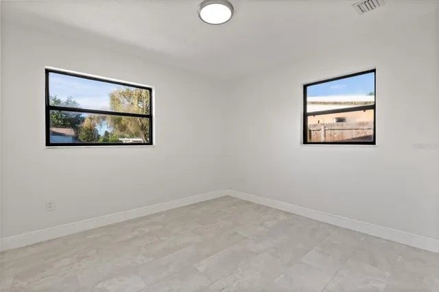 an empty room with an entryway