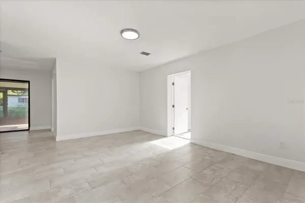 an empty room with window
