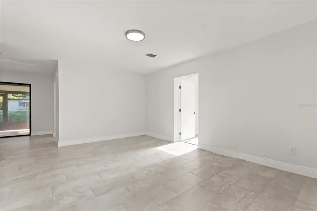 an empty room with window