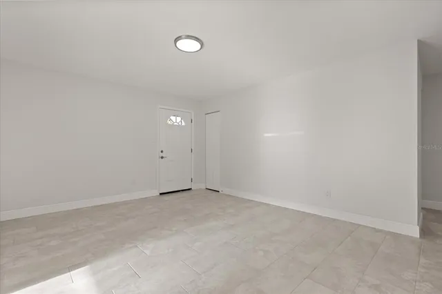 an empty room with an entryway