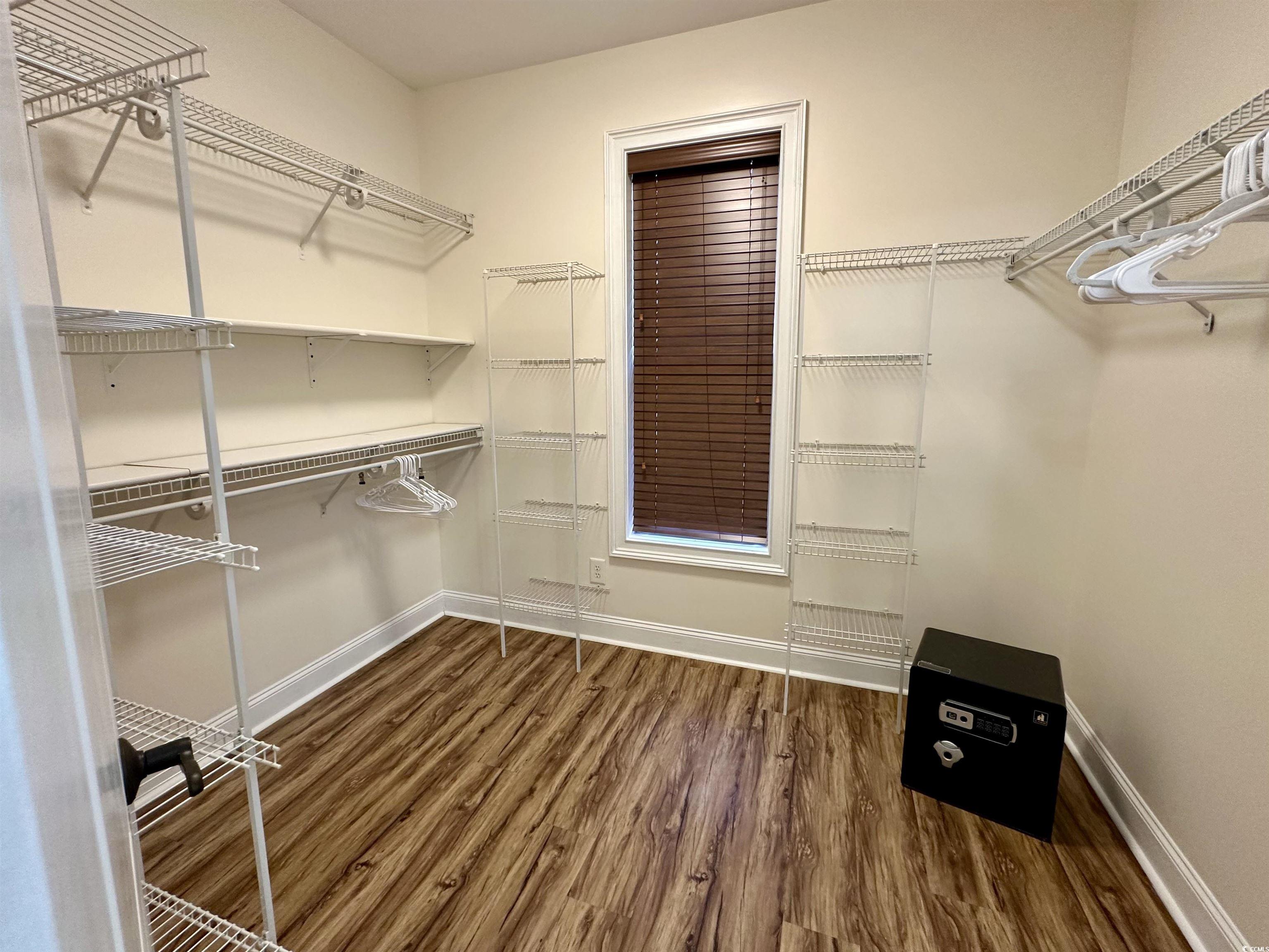 1069 Cole Court Myrtle Beach, SC 29577 - Photo 16 of 40 Spacious closet with dark wood-style floors