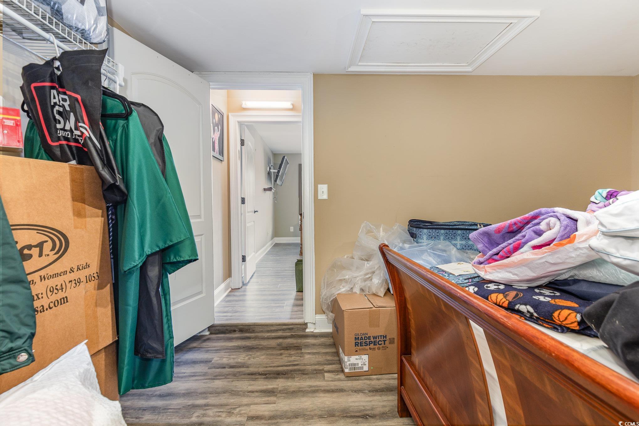 1069 Cole Court Myrtle Beach, SC 29577 - Photo 28 of 40 Bedroom with attic access and wood finished floors