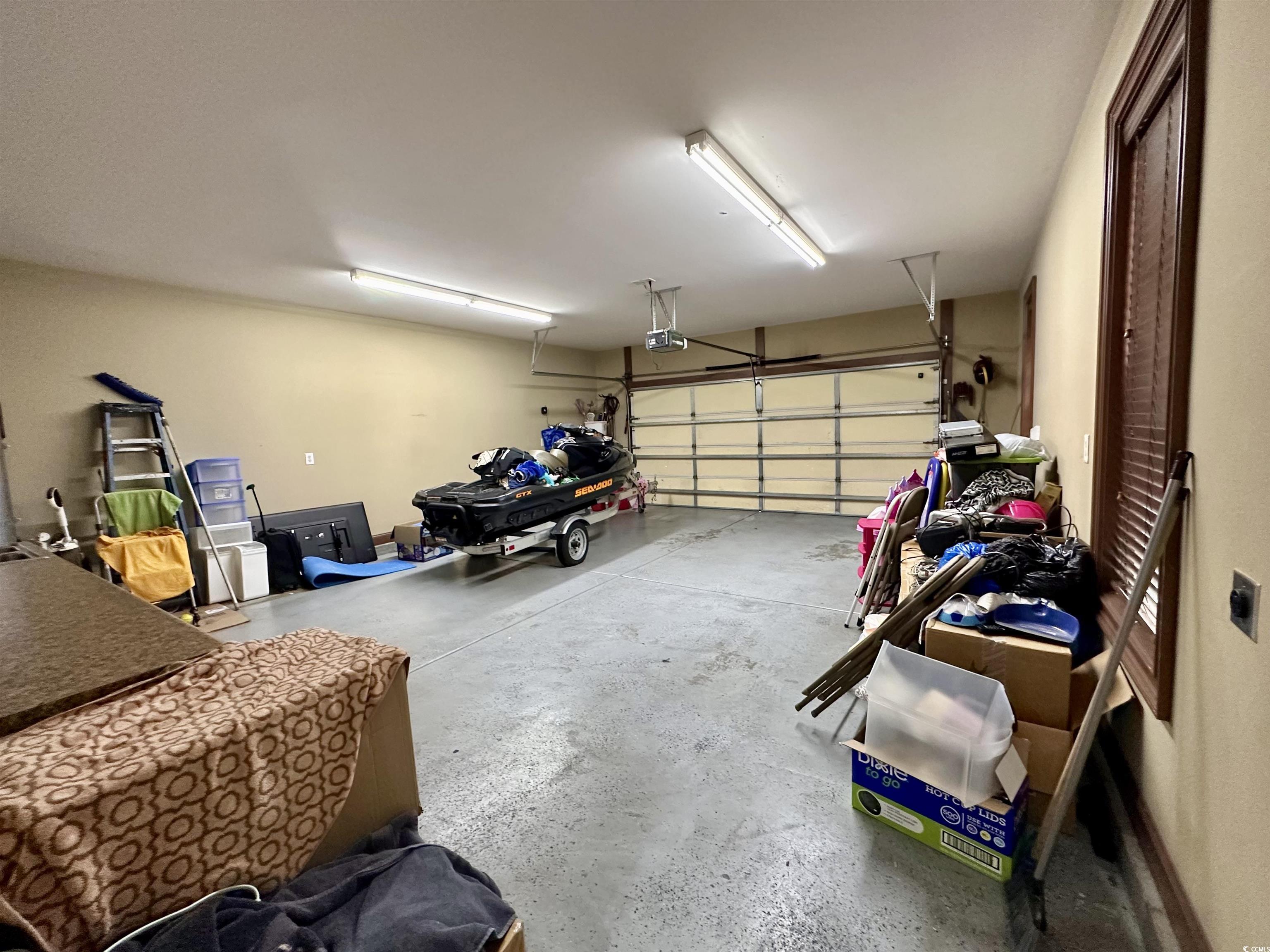 1069 Cole Court Myrtle Beach, SC 29577 - Photo 34 of 40 Garage with a garage door opener