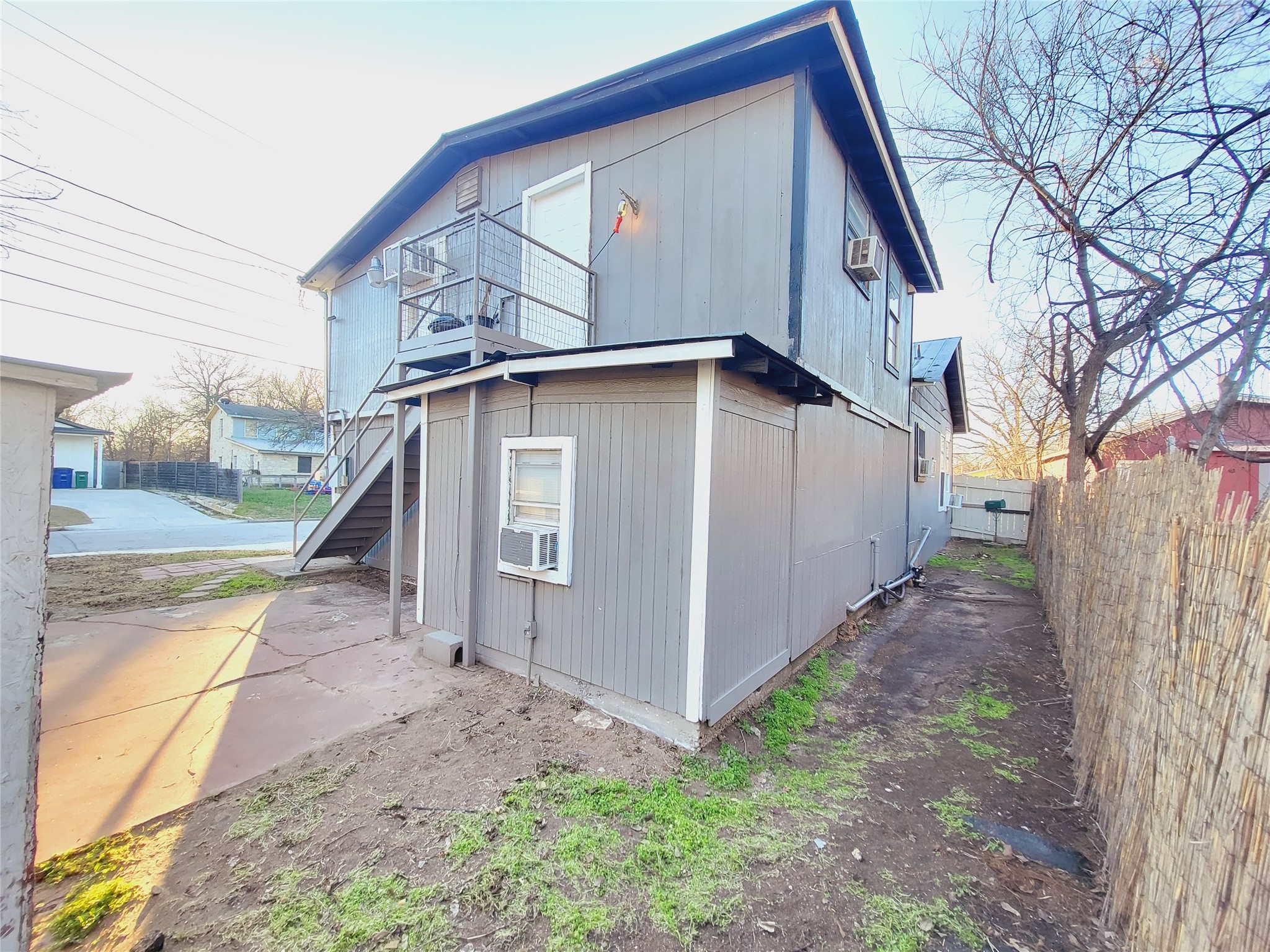 6404 Ponca Street, Unit B Austin, TX 78741 - Photo 16 of 17 a view of a house with a yard