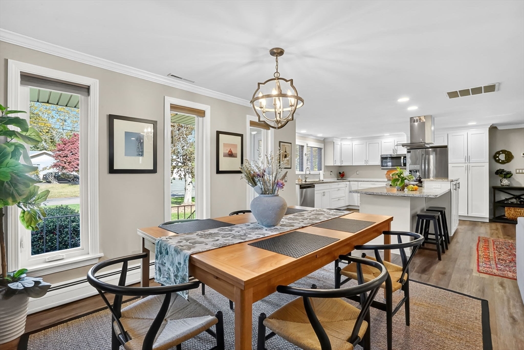 37 Captain Road Longmeadow, MA 01106 - Photo 8 of 42 a view of a dining room with furniture window and wooden floor