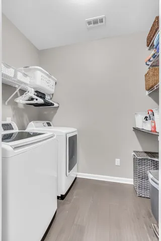 a view of a kitchen with appliances
