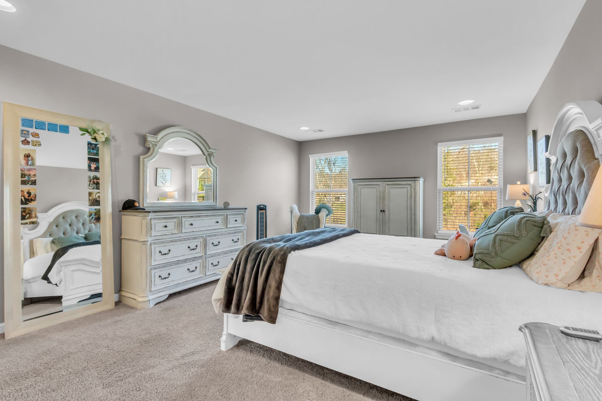 6930 Wellsford Lane College Grove, TN 37046 - Photo 25 of 44 a bedroom with a bed and a dresser