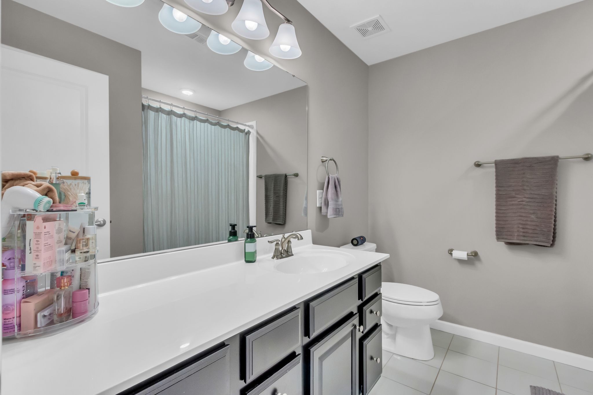 6930 Wellsford Lane College Grove, TN 37046 - Photo 27 of 44 a bathroom with a sink vanity granite and toilet