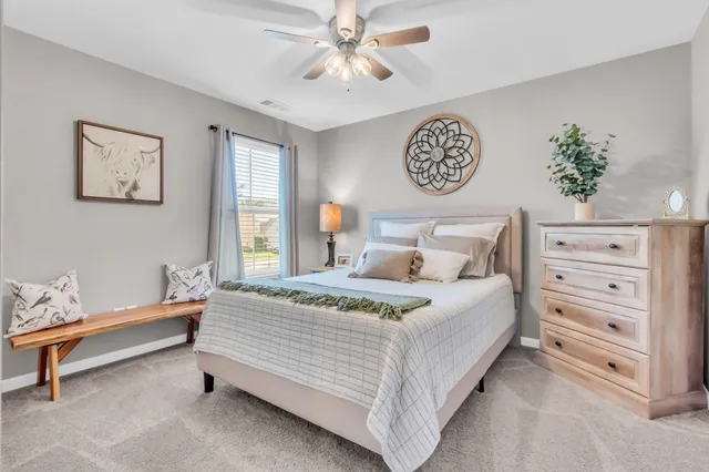 a living room with furniture and window