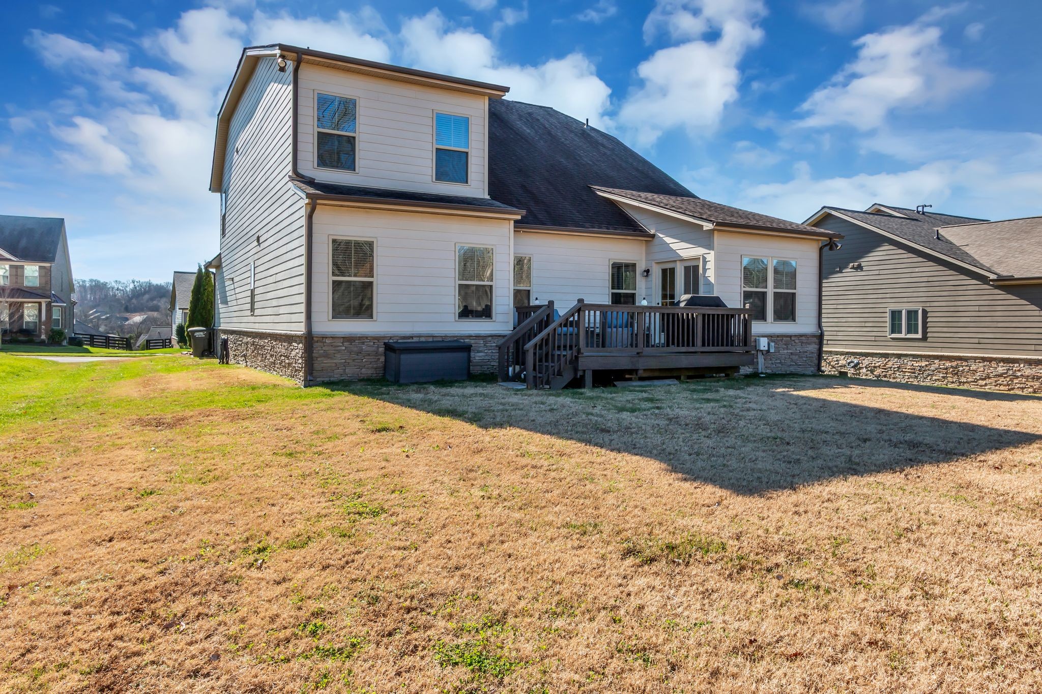 6930 Wellsford Lane College Grove, TN 37046 - Photo 37 of 44 a front view of a house with a yard and trees