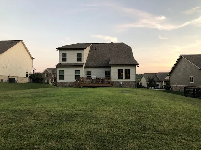a front view of a house with garage