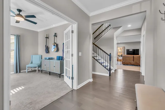 a view of livingroom with furniture and workspace