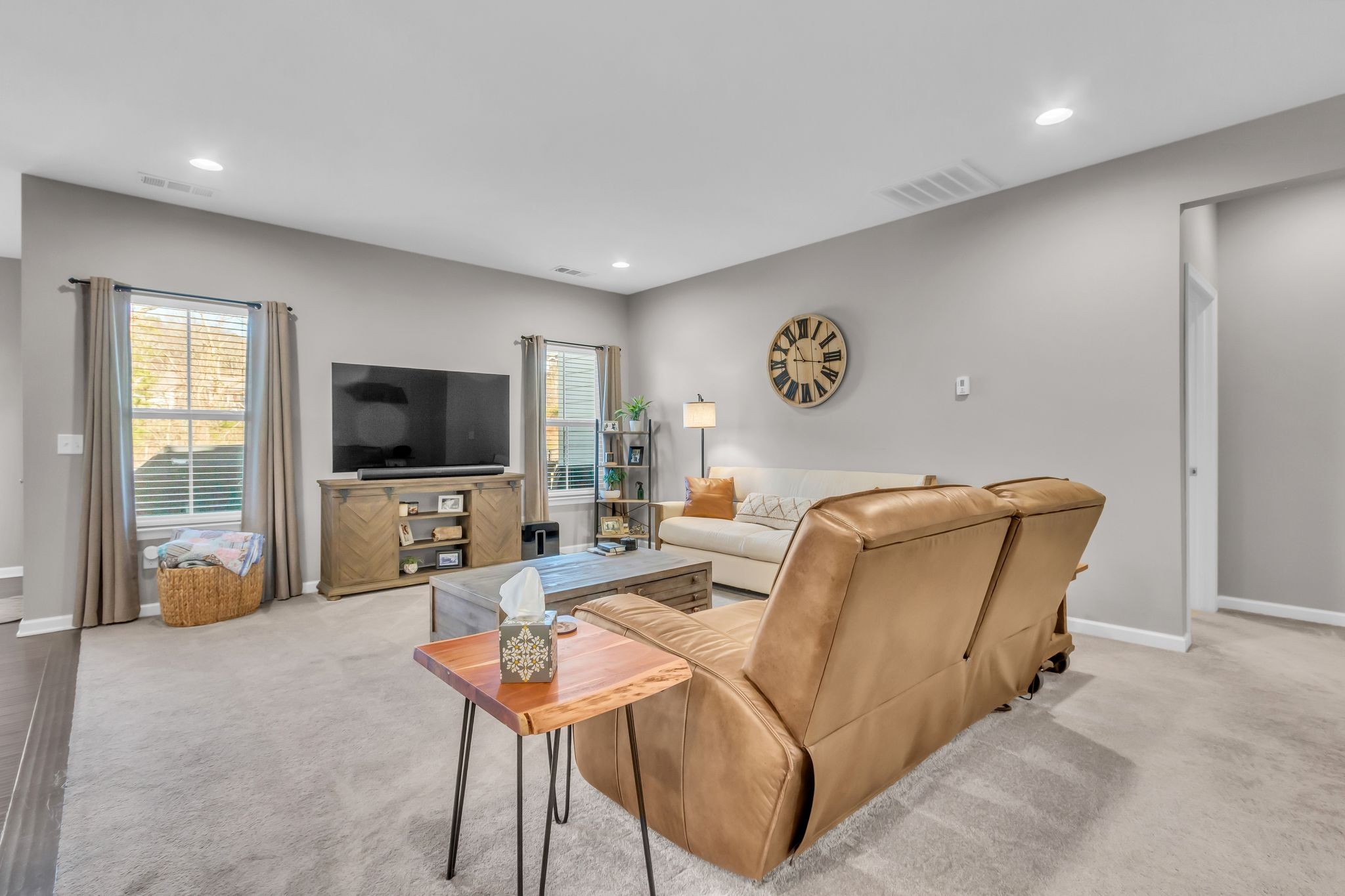 6930 Wellsford Lane College Grove, TN 37046 - Photo 8 of 44 a living room with furniture and a flat screen tv
