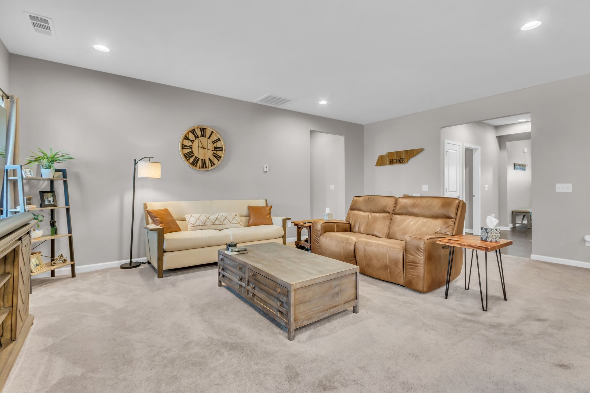 6930 Wellsford Lane College Grove, TN 37046 - Photo 9 of 44 a living room with furniture and a flat screen tv