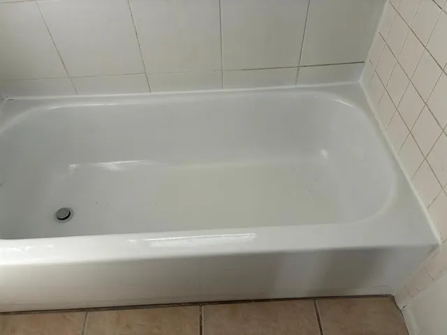 a view of an empty room with windows