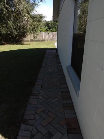 a view of a back yard of the house