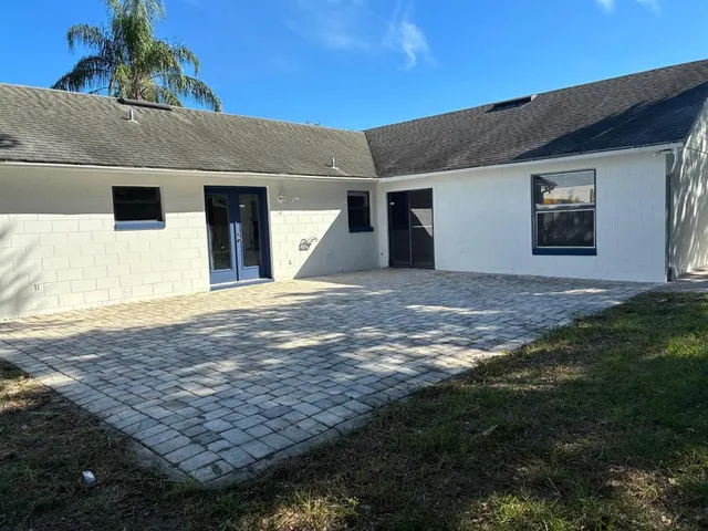 a backyard of a house with lots of green space